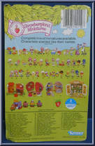 Strawberry Shortcake (with a Birthday Cake) from Strawberryland Miniatures - Miniatures manufactured by Kenner [Back]