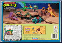 Cave Turtle Mike (with Silly Stegosaurus) from Teenage Mutant Ninja Turtles - Cave Turtles manufactured by Playmates [Back]