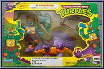 Cave Turtle Mike (with Silly Stegosaurus) from Teenage Mutant Ninja Turtles - Cave Turtles manufactured by Playmates [Front]