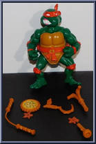 Michaelangelo (with Storage Shell) from Teenage Mutant Ninja Turtles - Storage Shell Turtles manufactured by Playmates [Loose]