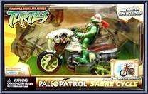 Sabre Cycle with Raphael from Teenage Mutant Ninja Turtles - Animated - Paleo Patrol: Vehicles manufactured by Playmates [Front]