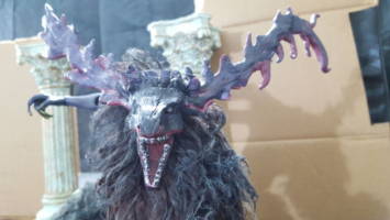 Cleric Beast vs Hunter Comic Strip Panel #9 [Face shakes as it howls]